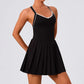 Women's high-end tennis dress with modern athletic fit designed for match play and club lifestyle