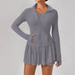 Luxury women’s tennis outfit featuring performance crop top, pleated tennis skirt and lightweight zip jacket, premium courtwear set designed for tennis and active lifestyle