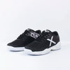 Close-up detail of refined tennis footwear featuring durable outsole construction and minimalist athletic styling