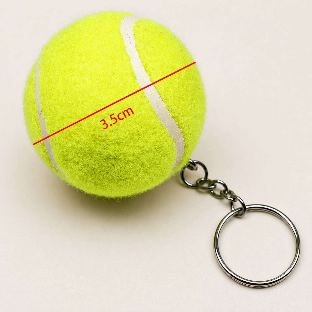 Minimal tennis-inspired keychain crafted for polished everyday styling and understated athletic lifestyle detail