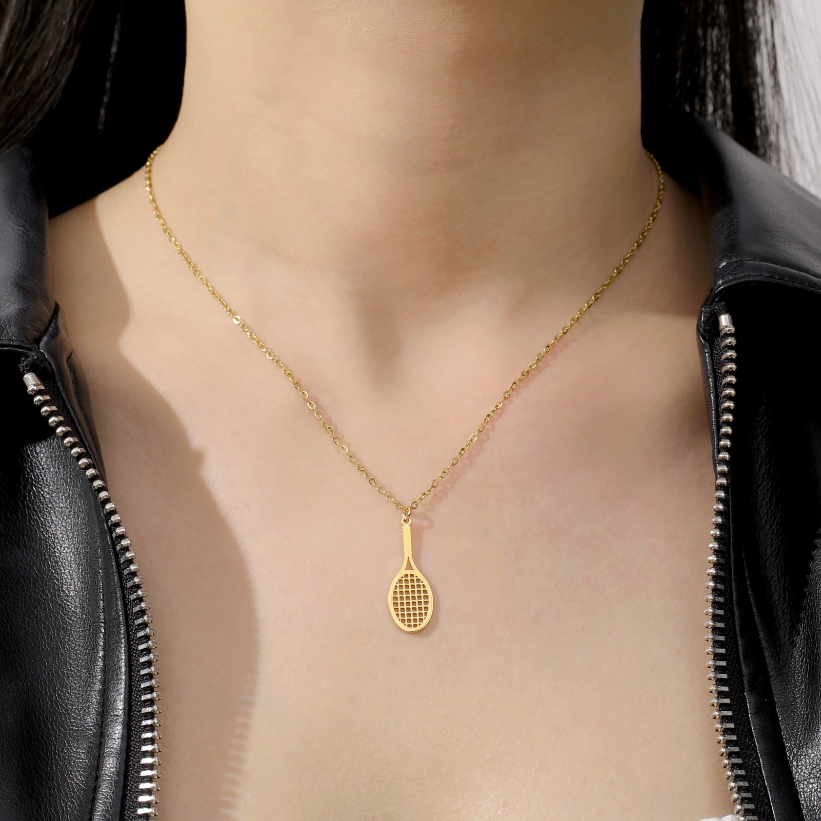 Minimal tennis-inspired pendant necklace crafted for understated elegance and modern athletic lifestyle accessorizing