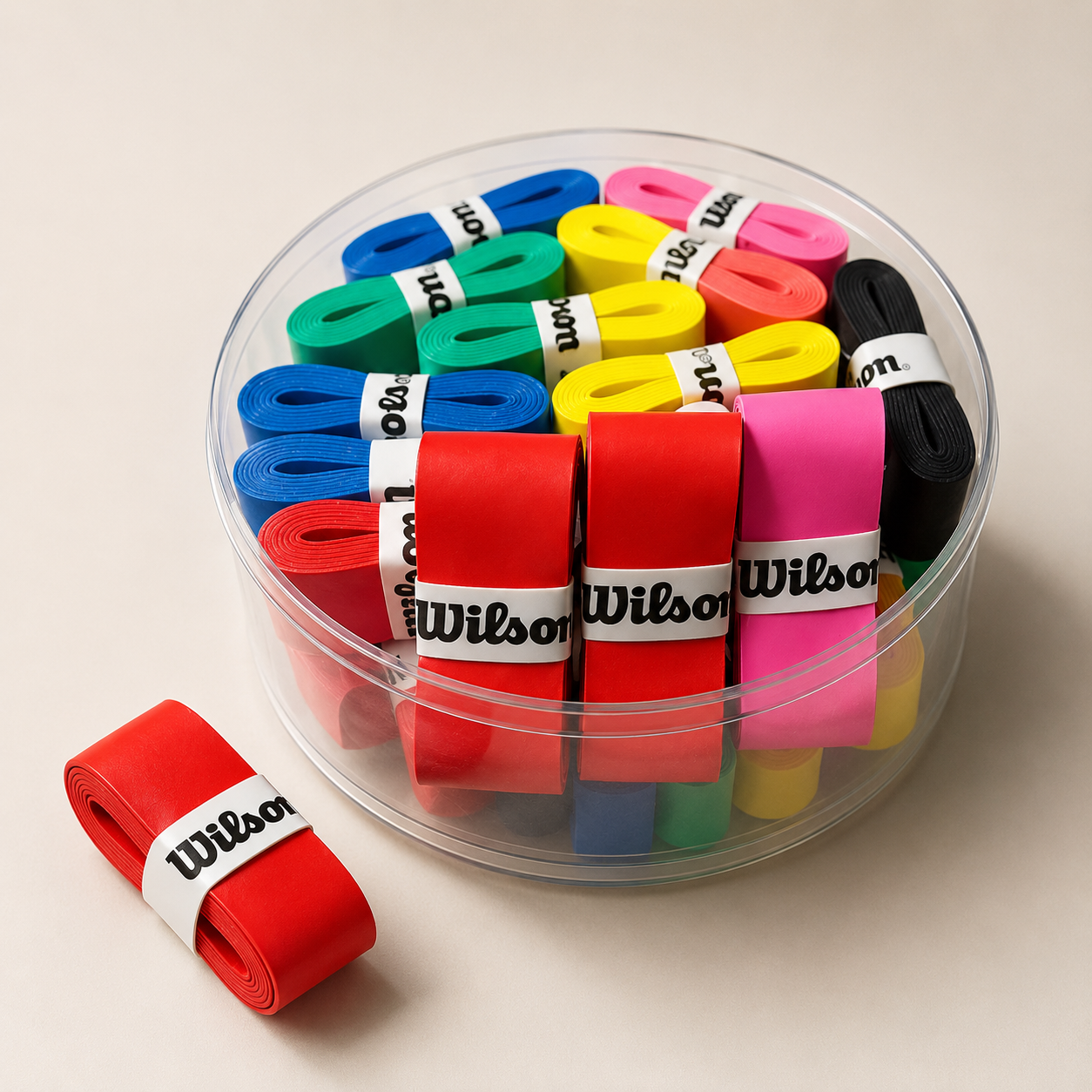 Close-up detail of premium tennis overgrip rolls with non-slip texture and clean athletic court styling