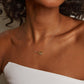 Editorial studio image of refined diamond tennis necklace with polished pendant and delicate chain styling