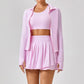 Premium women’s tennis apparel set with cropped performance top, pleated skirt and lightweight jacket, elegant luxury courtwear for modern tennis lifestyle