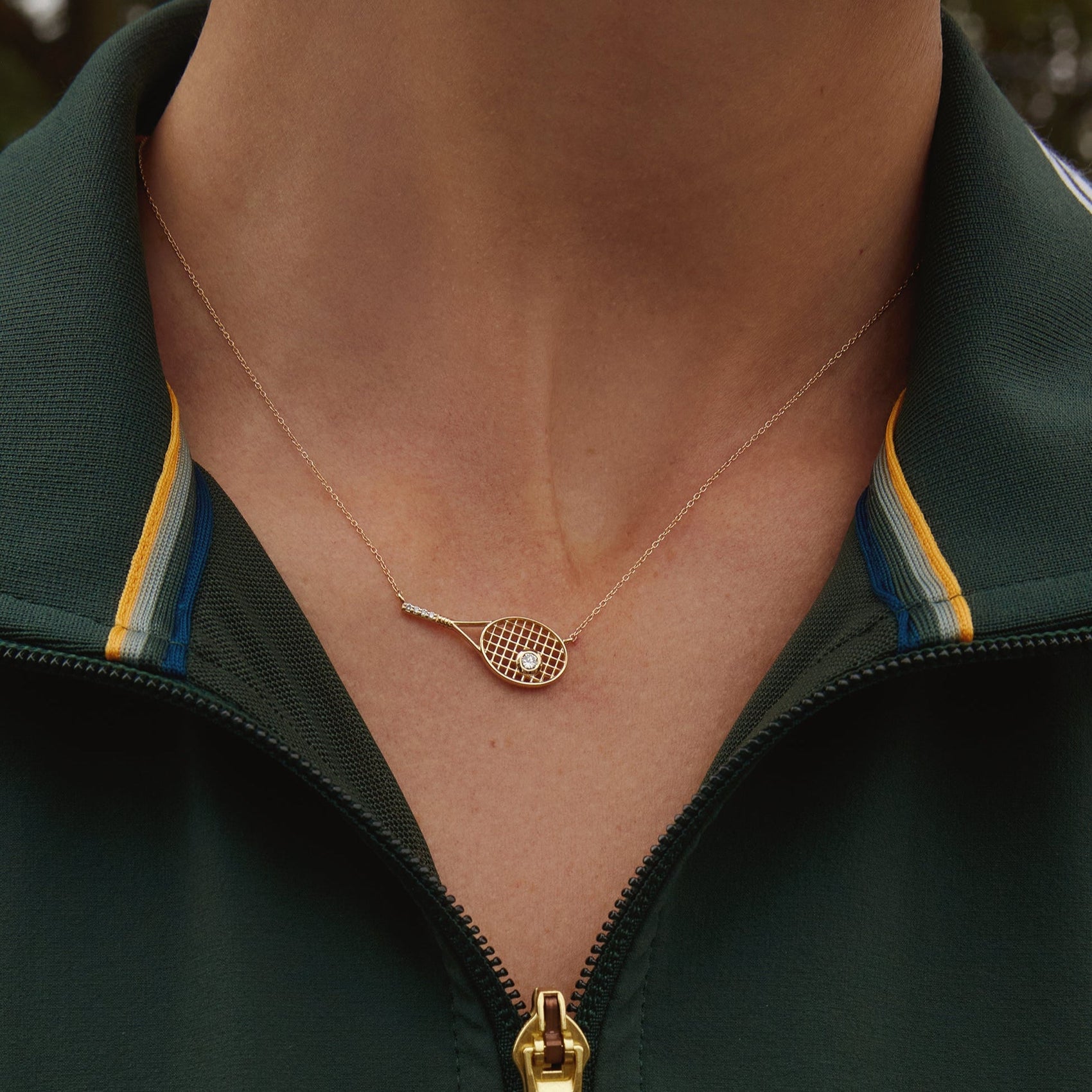 Refined sport-inspired necklace designed with radiant white sapphire-inspired accents and clean modern silhouette