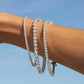 Premium continuous tennis bracelet silhouette with polished finish and elevated everyday elegance