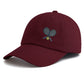 Close-up detail of premium retro tennis baseball cap with relaxed silhouette and refined sport lifestyle appeal