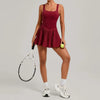 Luxury women's athletic tennis dress with fitted silhouette and flowing skirt for modern tennis lifestyle