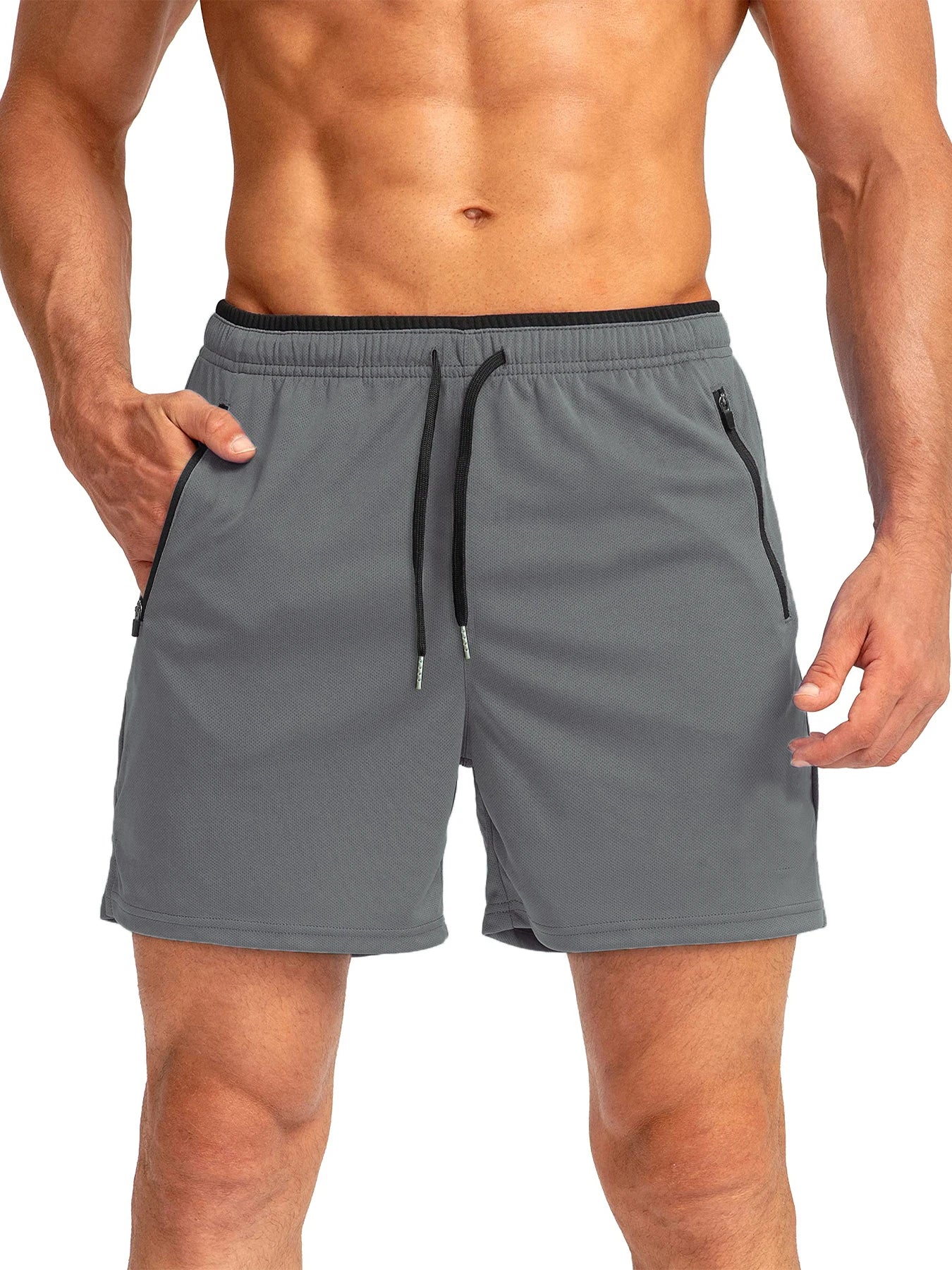 Editorial studio image of men's premium performance shorts featuring split-leg mobility cut and streamlined athletic silhouette