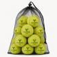 Editorial studio image of tennis balls and mesh storage bag with refined court-inspired presentation