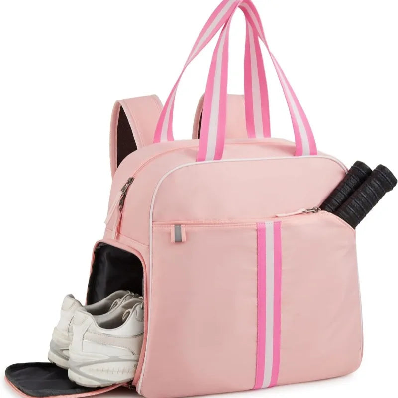 Handheld sport racket bag with multiple storage compartments and refined tennis-inspired everyday carry design