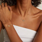 Editorial studio image of elegant white sapphire tennis bracelet with sleek racket-inspired luxury silhouette
