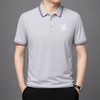 Men's breathable tennis-inspired polo designed for warm-weather comfort and polished everyday athletic wear