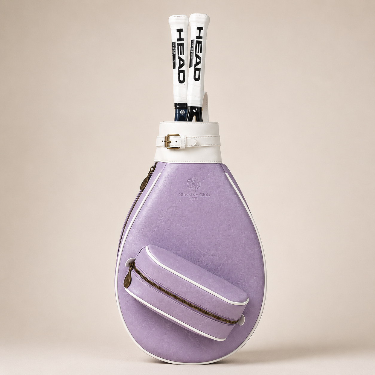 Editorial studio image of premium tennis shoulder bag featuring minimalist court-inspired silhouette and refined athletic sophistication