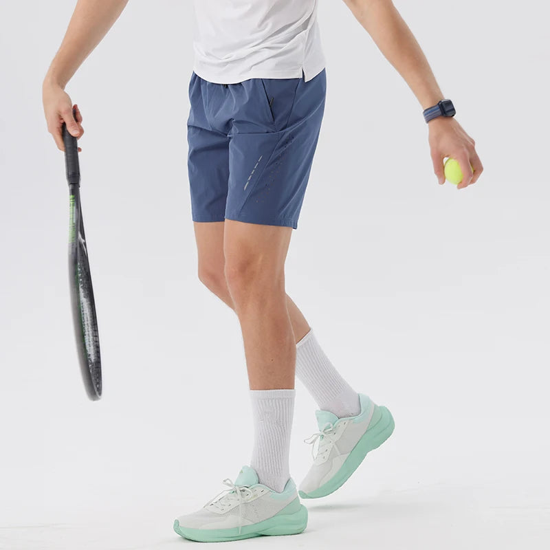 Men's tennis shorts with lightweight stretch fabric designed for breathable comfort and unrestricted movement on court