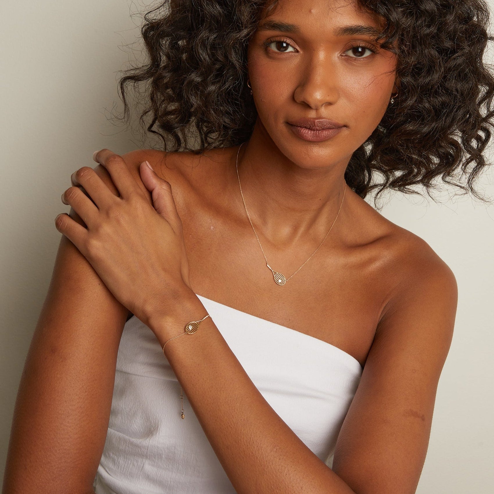 Minimal luxury tennis bracelet designed with racket-inspired silhouette and timeless court-inspired elegance