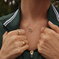 Minimal luxury tennis racket necklace designed for elevated jewelry layering and refined lifestyle styling