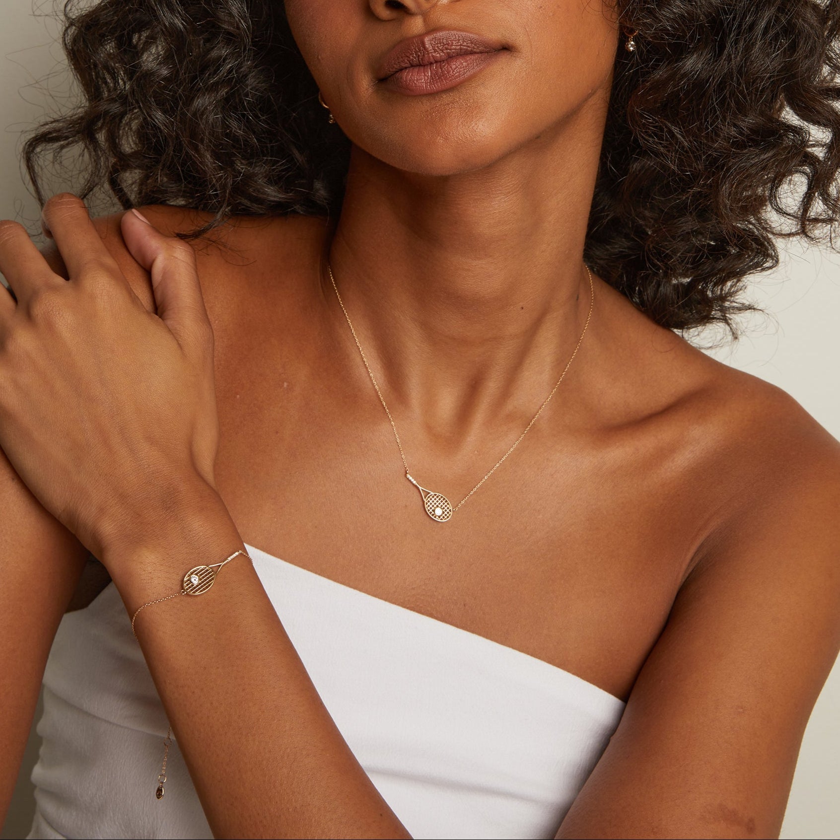 Premium sport-inspired necklace designed with luminous stone accents and sophisticated everyday elegance