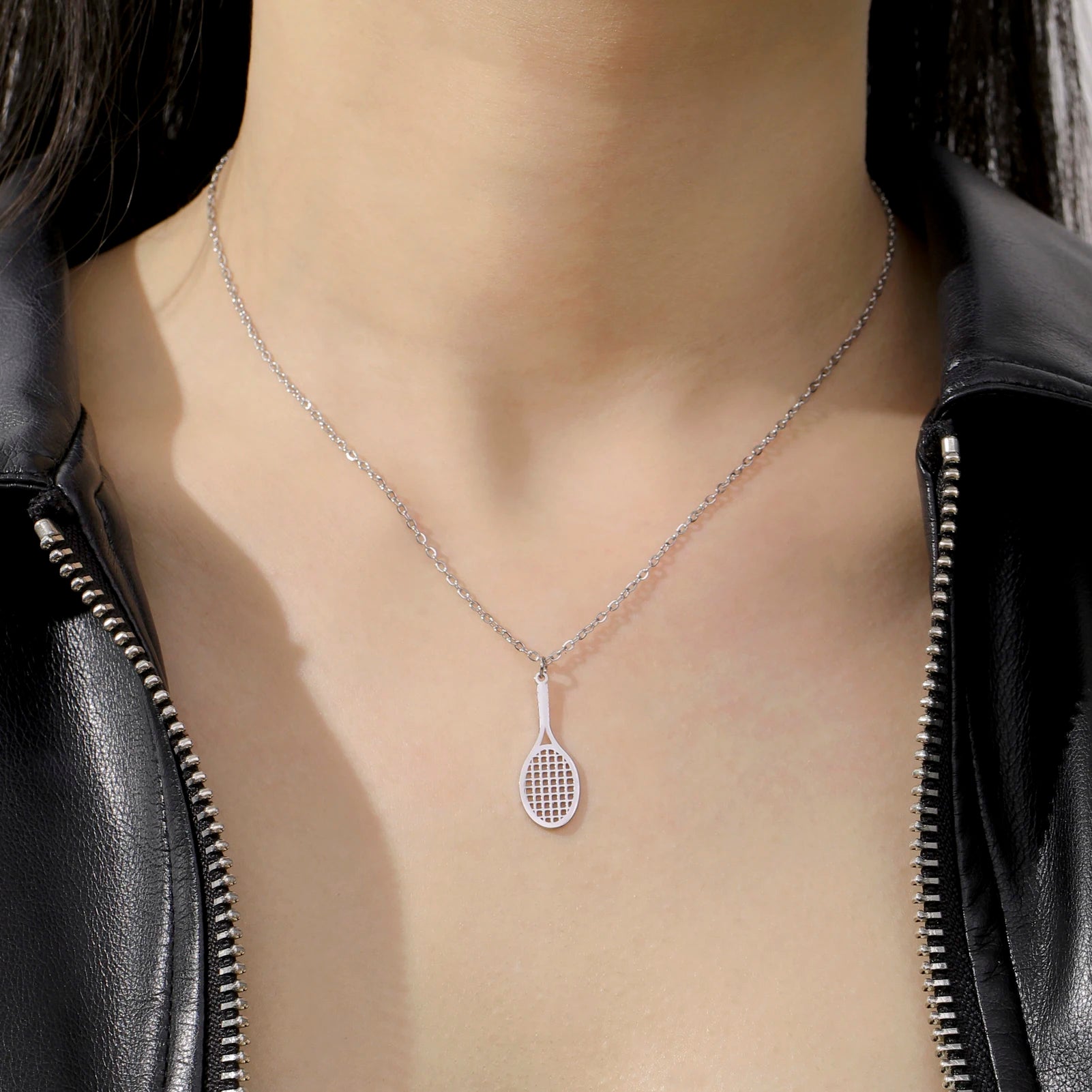 Premium stainless steel tennis racket necklace designed for elegant everyday wear and refined tennis-inspired styling