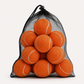 Close-up detail of premium tennis balls with textured felt surface and refined athletic presentation