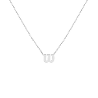 Editorial studio image of premium tennis-inspired necklace featuring delicate chain and refined minimalist luxury styling