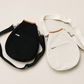 Compact nylon racket case with streamlined protective silhouette and refined active lifestyle functionality