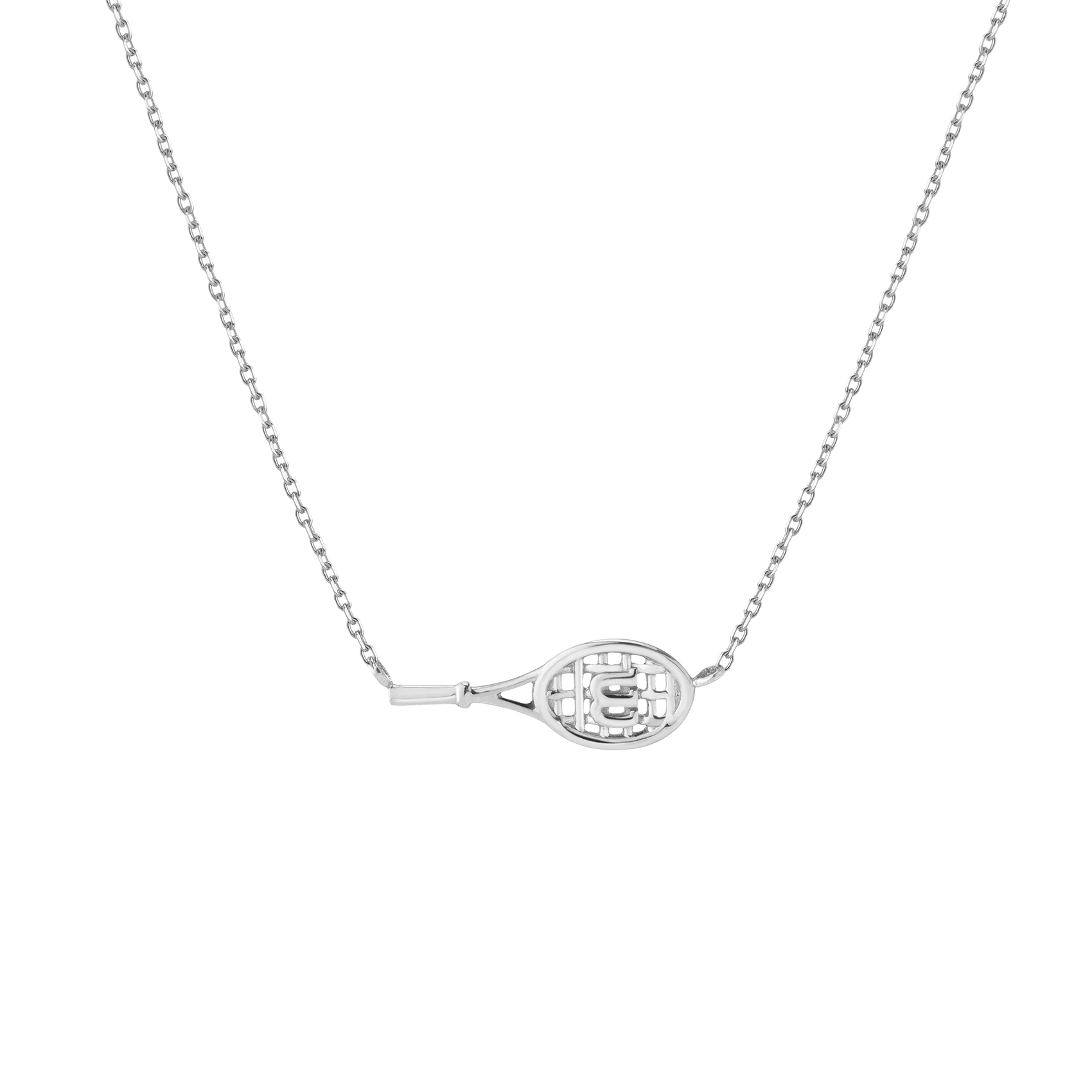 Editorial studio image of premium racket-inspired necklace featuring refined minimalist jewelry styling and modern court heritage