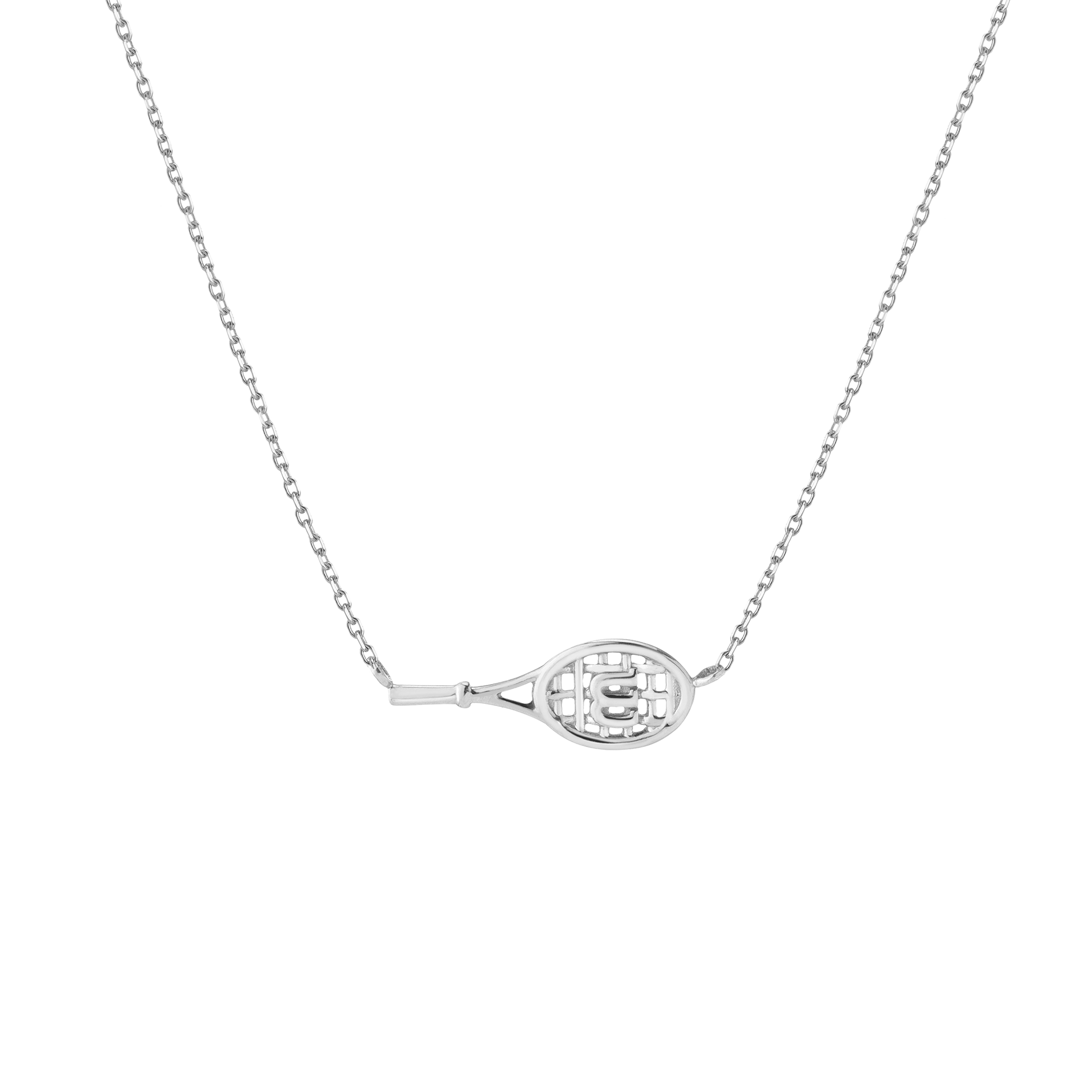 Editorial studio image of premium racket-inspired necklace featuring refined minimalist jewelry styling and modern court heritage