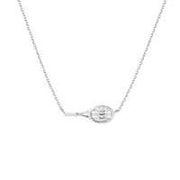 Editorial studio image of premium racket-inspired necklace featuring refined minimalist jewelry styling and modern court heritage