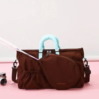 Close-up detail of premium racket sports bag featuring spacious organized compartments and clean court-inspired styling