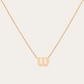Premium gold tennis-inspired pendant necklace designed for elegant everyday wear and refined court lifestyle styling