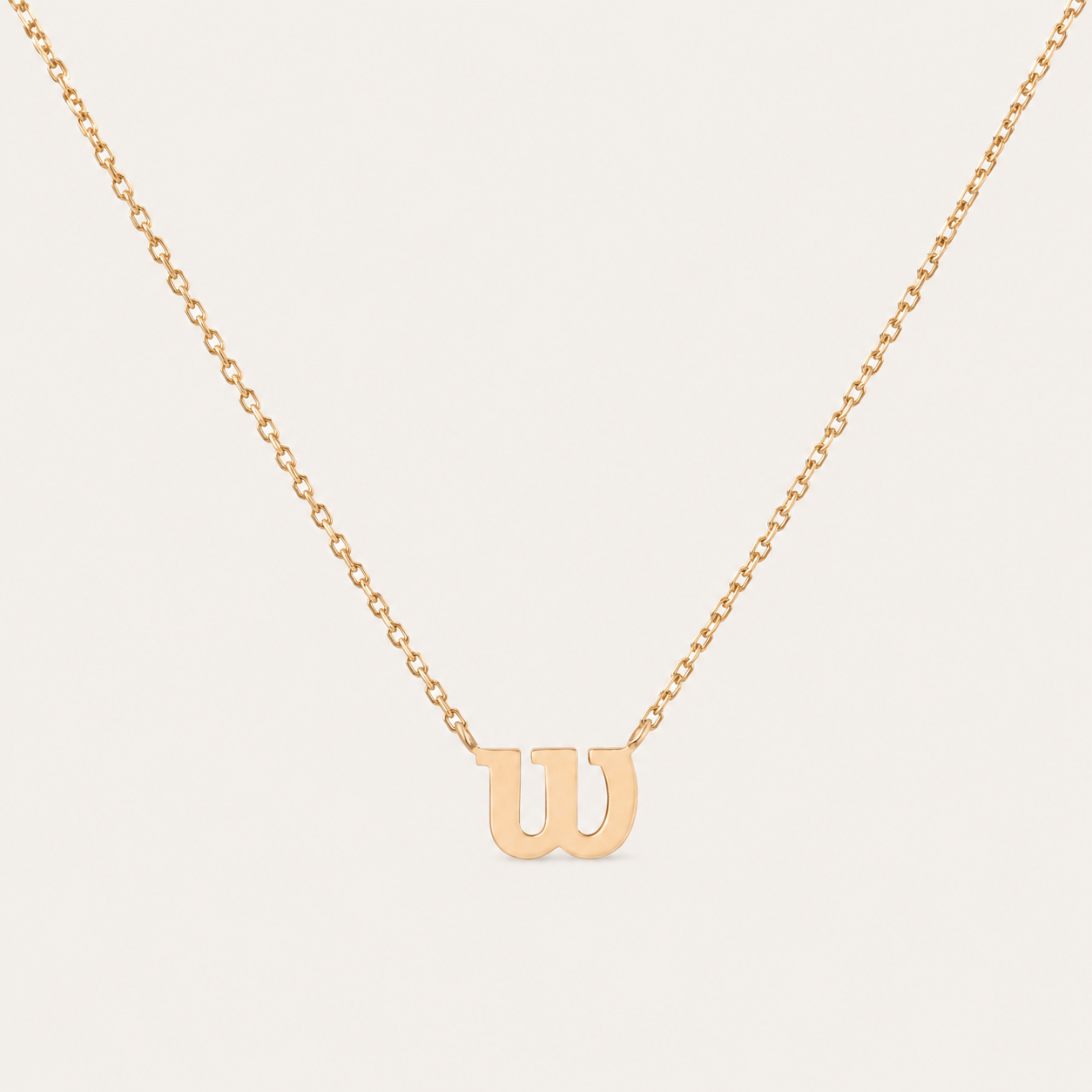 Premium gold tennis-inspired pendant necklace designed for elegant everyday wear and refined court lifestyle styling