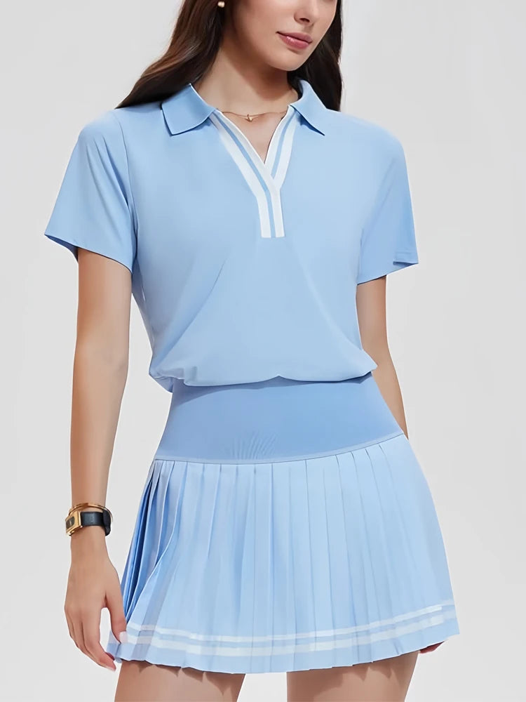 Premium women's tennis dress with elegant pleated skirt, flattering athletic cut, and polished lifestyle-meets-performance appeal.