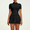 Women's luxury tennis two-piece set featuring structured short sleeve zip top and pleated skirt, blending performance comfort with elevated court style.