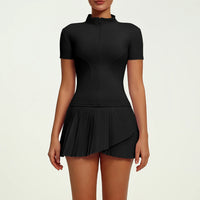 Women's luxury tennis two-piece set featuring structured short sleeve zip top and pleated skirt, blending performance comfort with elevated court style.
