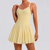 Stylish women's pleated tennis dress for performance training tennis matches and elevated court fashion