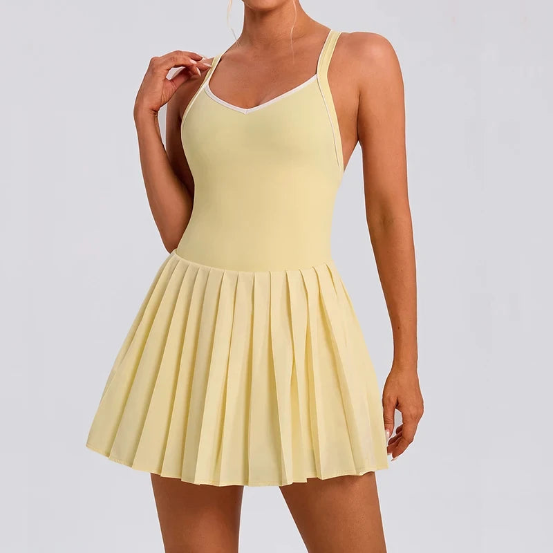 Stylish women's pleated tennis dress for performance training tennis matches and elevated court fashion