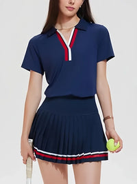 Premium women's pleated tennis dress styled on court with elegant athletic silhouette, performance fit, and modern country club aesthetic.