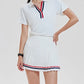 Sophisticated women's tennis dress with classic sport detailing, lightweight performance fabric, and premium tennis club aesthetic.