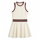 Premium women's tennis apparel featuring a sleeveless design, built-in comfort support, and performance-focused fit.