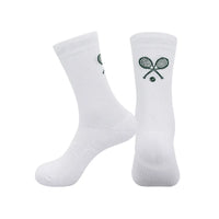 Premium crew socks designed for tennis, featured in a refined athletic footwear editorial image