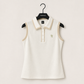 Detailed view of tennis polo neckline with elegant embroidery, precision tailoring, and premium construction designed for court and lifestyle wear.
