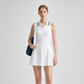 Women's luxury tennis dress combining elegant tailoring, breathable comfort, and versatile tennis lifestyle appeal beyond the court.