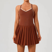 Luxury women's tennis dress with pleated skirt and sleek silhouette for on-court performance and style