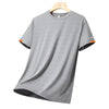 Male tennis player wearing a refined performance tennis t-shirt made for comfort, movement, and active court sessions.