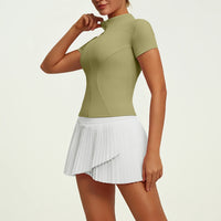Women's premium fitted tennis set with modern zip collar top and pleated performance skirt, balancing athletic precision with sophisticated lifestyle appeal.