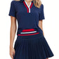 Elegant women's tennis dress featuring a tailored athletic fit, graceful pleated movement, and premium country club inspired styling.