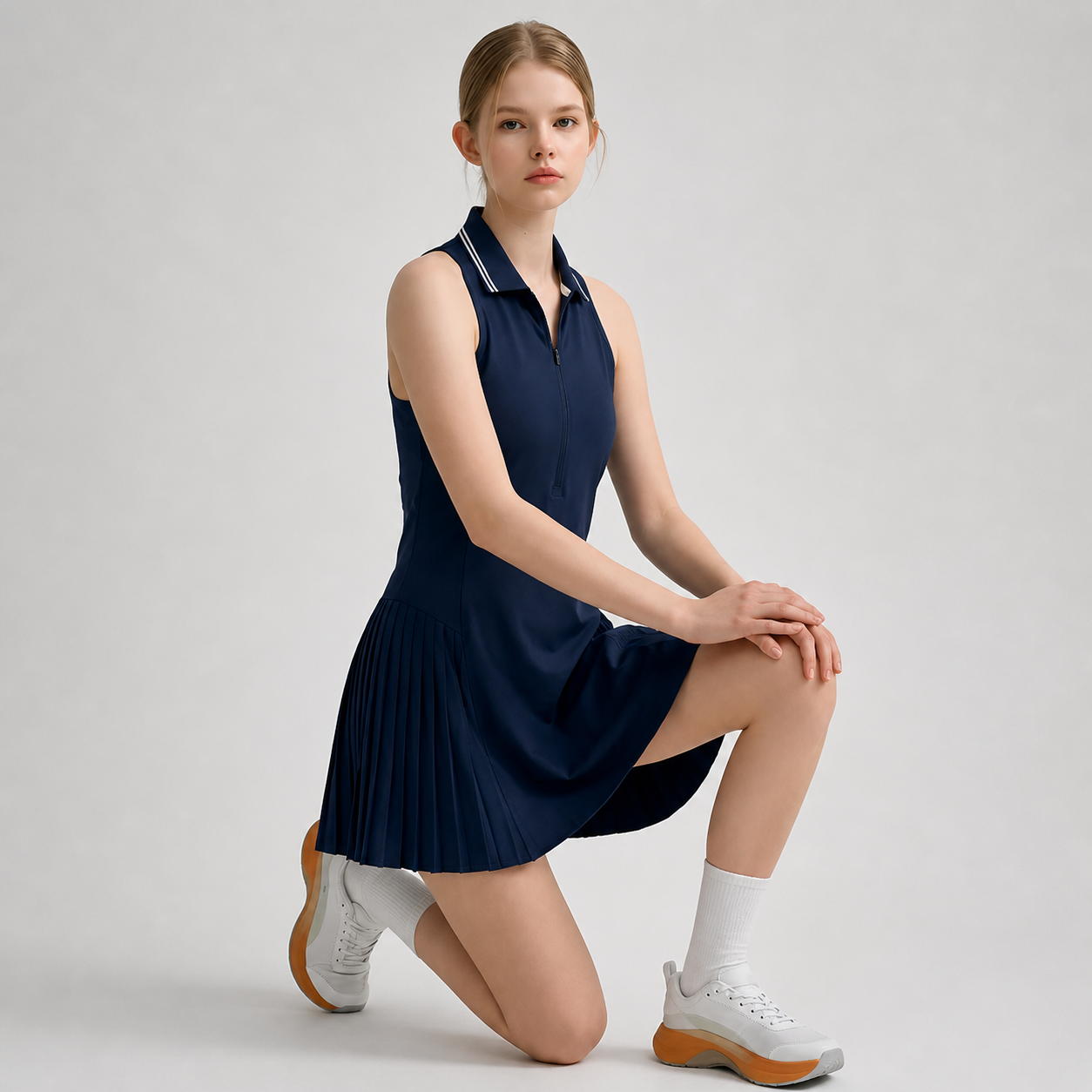 Premium sleeveless tennis dress for women featuring a refined athletic silhouette built for mobility, comfort, and elevated tennis lifestyle wear.