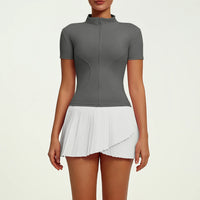 Women's refined tennis lifestyle set featuring fitted performance top and pleated skirt, combining elegant silhouette, freedom of movement and premium comfort.