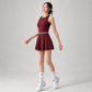 Modern women's tennis dress featuring a refined silhouette, breathable construction, and support made for active play.